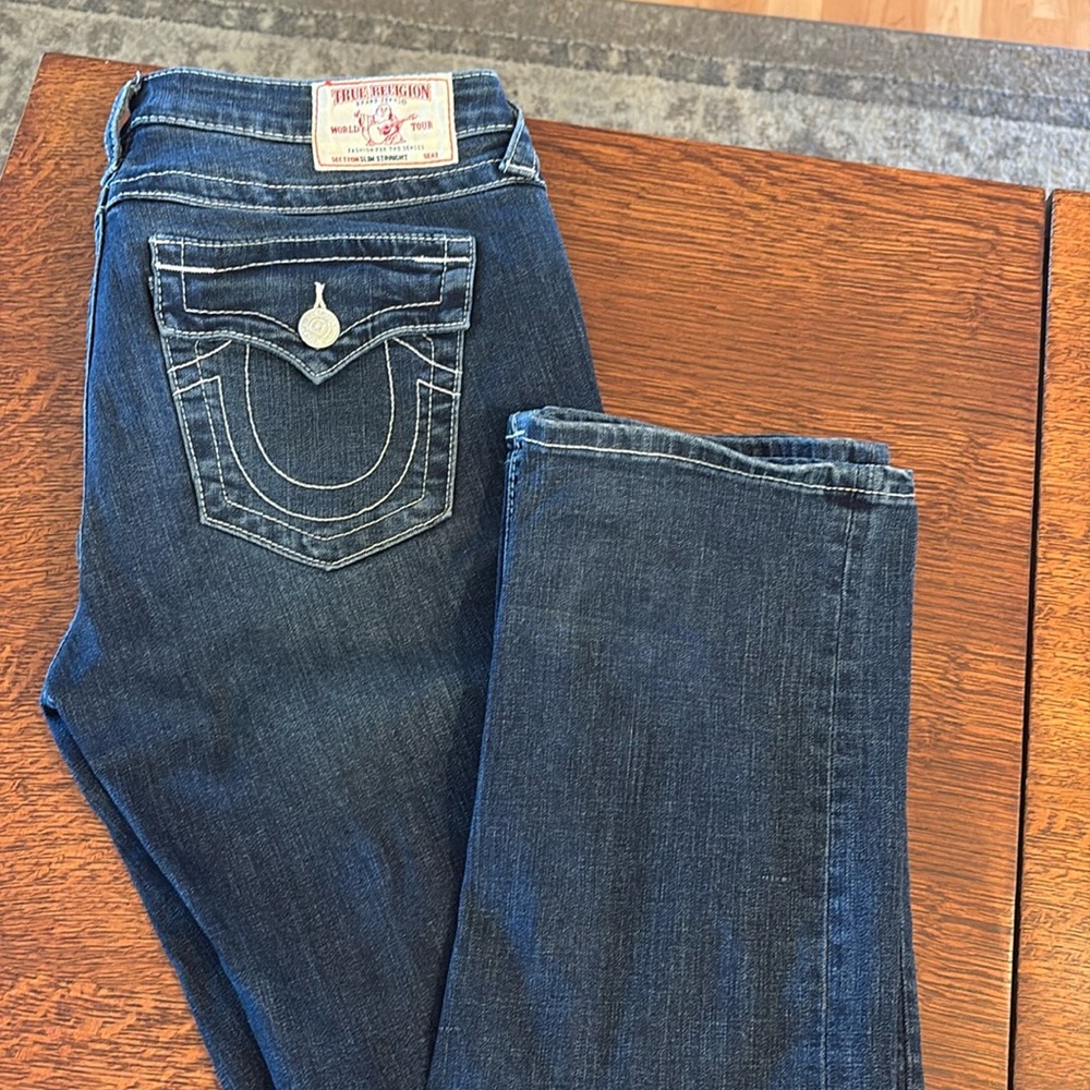 Women’s true religion dark wash boots cut jeans. Size 31. Excellent condition.